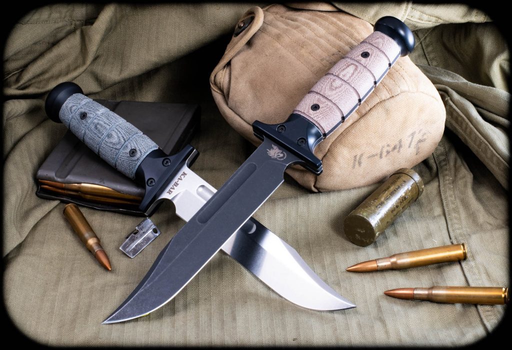Rick Hinderer KaBar photo with field gear and bullets